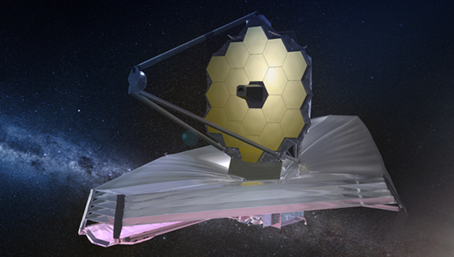 Image shows the James Webb Space Telescope in Outer Space.Behind telescope are Stars, Galaxies and bright light from a star.