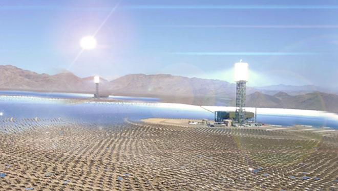 Desert landscape with hundreds of motion controlled solar-tracking heliostat panels and Brightsource technologies.